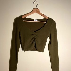 Cute green long sleeve with low cut neck